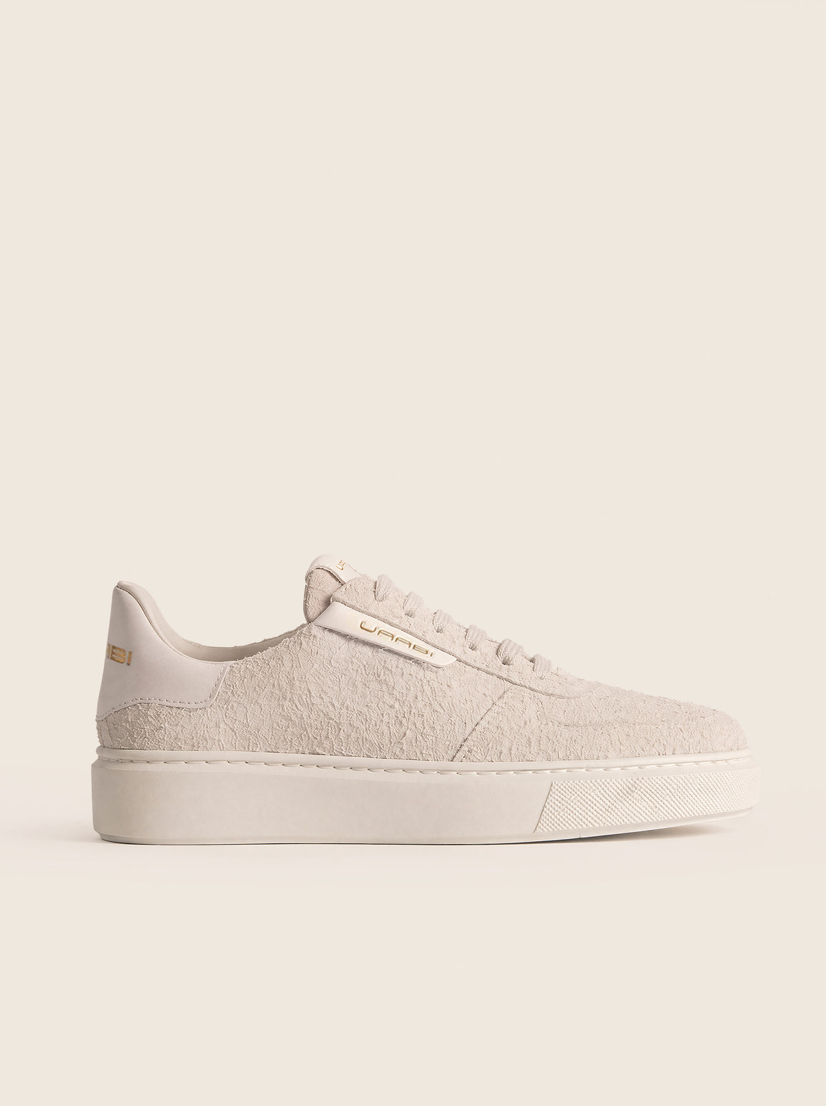 Sneaker EERSTE W21 en piel vuelta blanco roto, vista lateral